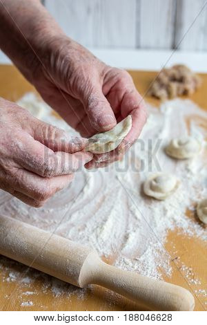 Sculpting Of Traditional Russian Meat Dumplings With Minced Meat