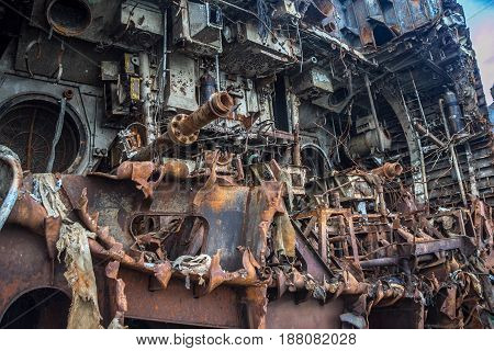 Rusty ruins of Russian sunken warship Indomitable (Neukrotimiy) raised from the bottom and sawed for scrap metal.