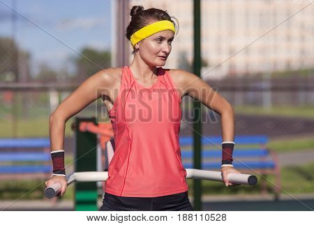 Sport Ideas. Caucaasian Professional Female Athlete In Outfit Having Fitness Workout Training Outdoor.Horizontal Image