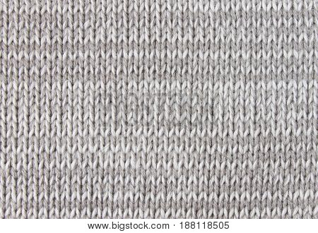 Vertical black and white knitting fabric texture background or knitted pattern background for design. Knitting or knitted background.  Knitting pattern or knitted pattern for design. Small gray knit texture or knit pattern.