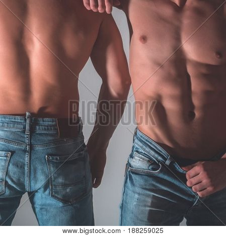 Front And Back Of Two Male Torsos