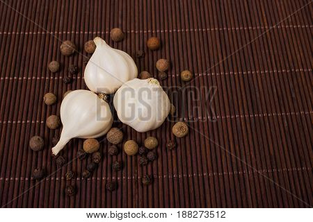 Head Of Garlic And Pepper