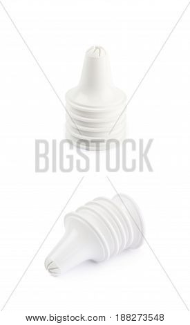 Decorational cream piping bag's plastic tip isolated over the white background, set of two different foreshortenings