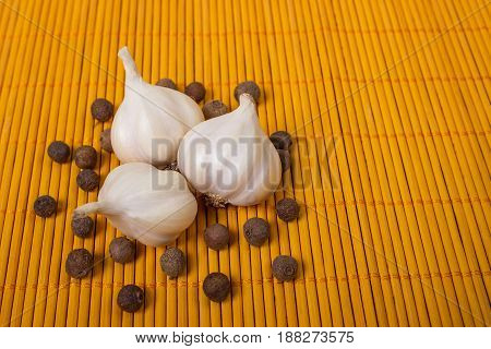 Head Of Garlic And Pepper