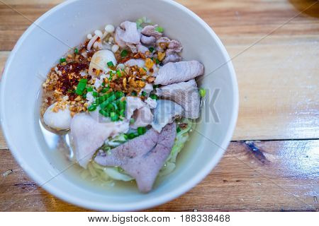 Local Thai noodle breakfast pork and vegetable in bowl