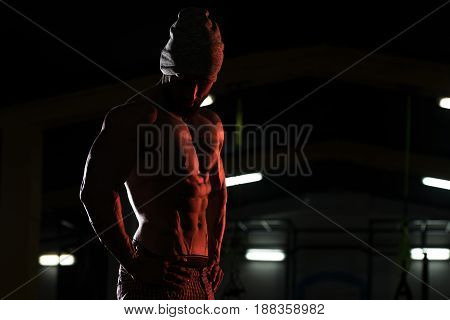 Silhouette Bodybuilder Flexing Muscles