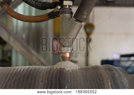 Overlay welding hard surfacing of steel roll by submerge arc welding process