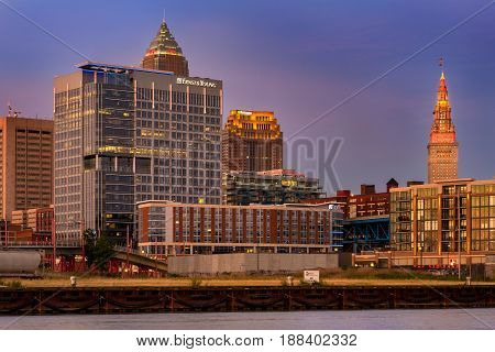 CLEVELAND OH - JUNE 19 2016: The Ernst & Young Building and the Aloft Hotel are two of the newer buildings in the Flats overlooking the Cuyahoga River near its lakefront outlet.