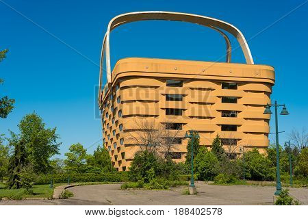 NEWARK OH - MAY 15 2017: The world's largest picnic basket was once the headquarters of the Longaberger Company. It stands 7 stories tall and is twice as long as a football field at the top. It has been empty since 2016.