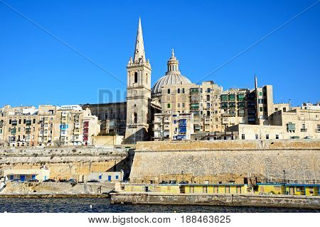 VALLETTA, MALTA - MARCH 30, 2017 - View of St Pauls Anglican Cathedral and the Basilica of Our Lady of Mount Carmel Valletta Malta Europe, March 30, 2017.