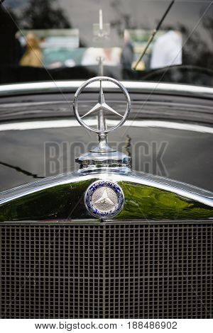 BERLIN GERMANY - MAY 17 2014: Hood ornament of the luxury car Mercedes-Benz Typ 290 (W18) 1933. Close up. 27th Oldtimer Day Berlin - Brandenburg