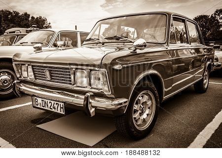 BERLIN GERMANY - MAY 17 2014: Large family car Fiat 125S 1970. Sepia. 27th Oldtimer Day Berlin - Brandenburg