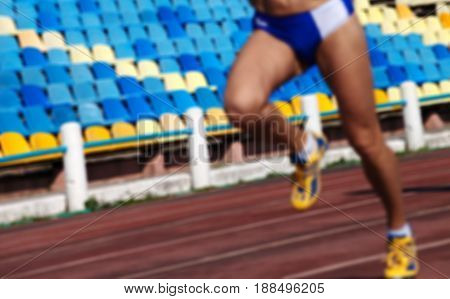 Blurred Athletic Running Competition At Stadium Not In Focus
