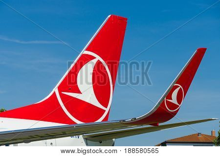 BERLIN GERMANY - MAY 21 2014: Detail of the wing of a short-to medium-range twinjet narrow-body airliner Boeing 737-800. Turkish Airlines. Exhibition ILA Berlin Air Show 2014