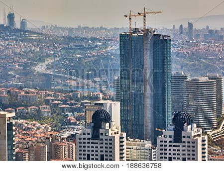 Bosphorus Bridge, a bridge which connects Europe and Asia, Istanbul, Turkey. Shooting through the glass. Retro style