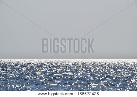 Sea Line Of The Horizon. Sea And Sky. The Waves And Glare Of The Sun Are Reflected From The Waves Of