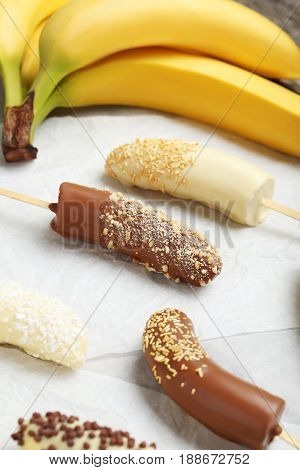 Banana Covered In Chocolate On A Pergament