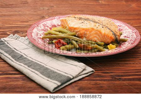 Salmon steak, veggies and herbs. Healthy eating concept