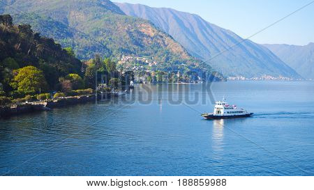 Ferry ride in Lake Como with mountain background
