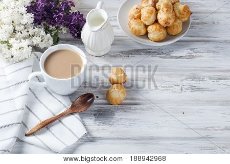 Coffee And Eclairs On A White Background
