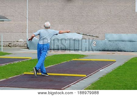 21.05.2017.Russia.Saint-Petersburg.Gorodki - a Russian folk sports game. In this game you need specific distances to smash figures made in different ways from five wooden cylinders.