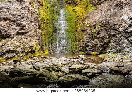 Little Waterfall In Green Summer Mountains, Norway.
