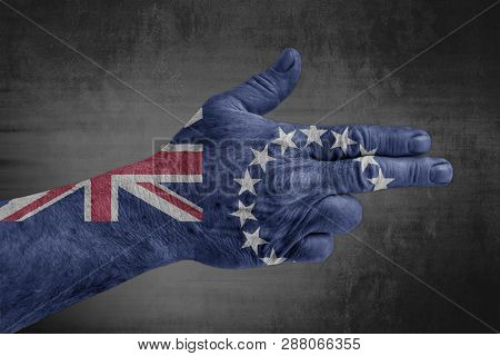 Cook Islands Flag Painted On Male Hand Like A Gun