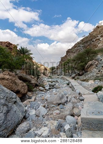 Parched Riverbed Called Wadi In Asia, In The Outskirts Of Muscat, Oman