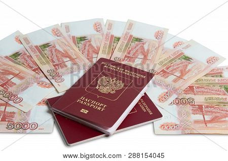 Biometric Passport And Two Banknotes For A Hundred Dollars Visa Free Travel. Travel Expenses Concept