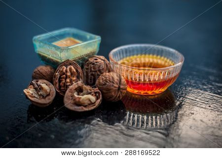 Close Up Of Best Home Remedy To Treat Anemia In A Glass Bowl On Wooden Surface Consisting Of Walnut