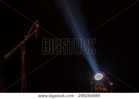 Stage Lights. Several Projectors In The Dark. Multi-colored Light Beams From The Stage Spotlights On