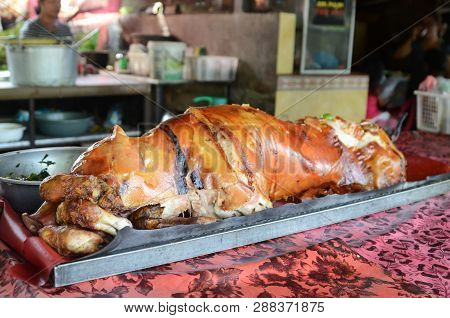 Bali, Indonesia- 23 Feb 2019: Local Vendor Selling Babi Guling Suckling Pig In Local Market.this Is 