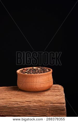 Bowl Of Various Pepper Peppercorns Seeds Mix On Table Rastic Style Background