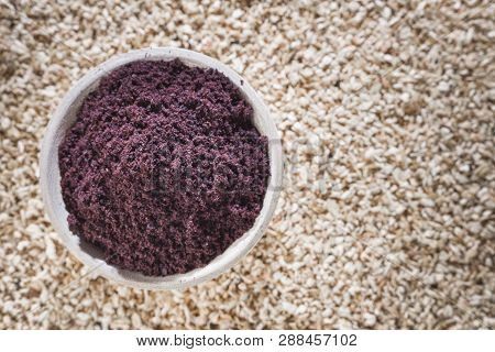 Acai Powder In Bowl On Wooden Background