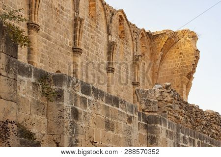 Ruins Of The Abbey Of Bellapais In The Northern Cyprus. Bellapais Abbey Is The Ruin Of A Monastery B