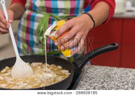 Cook Tastes Meat Sauce In The Kitchen With Whipped Cream - Close-up Sliced