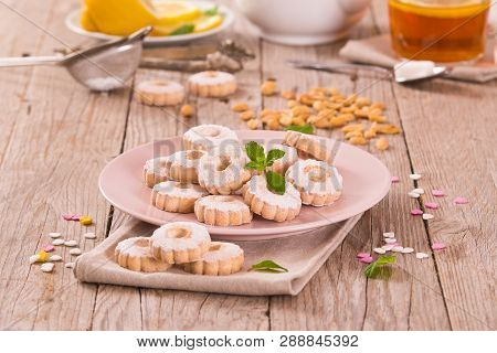 Teatime With Canestrelli Italian Butter Biscuits On Wooden Table.