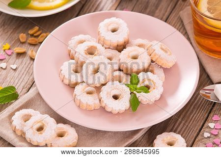 Teatime With Canestrelli Italian Butter Biscuits On Wooden Table.