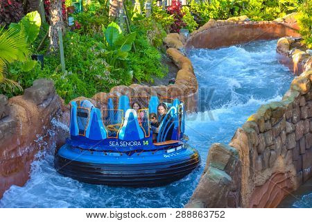 Orlando, Florida. January 20, 2019 People Enjoying River Attraction Ride Infinity Falls At Seaworld 