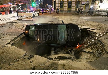 Car Partially Collapsed Under The Ground