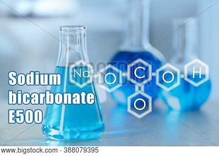 Text Sodium Bicarbonate E500 With Soda Formula And Laboratory Glassware On Background