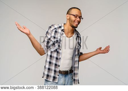 I Dont Know Gesture - Young Afrcian American Man Over Grey Background Being At A Loss, Showing Helpl