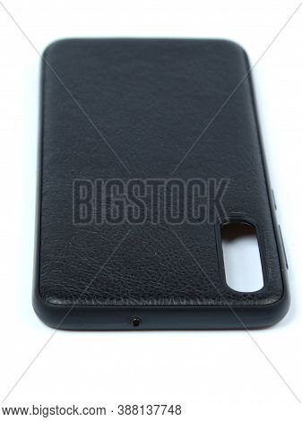 Moscow, Russia - February 22, 2020: Black Smartphone On A White Background In A Transparent Case Fro