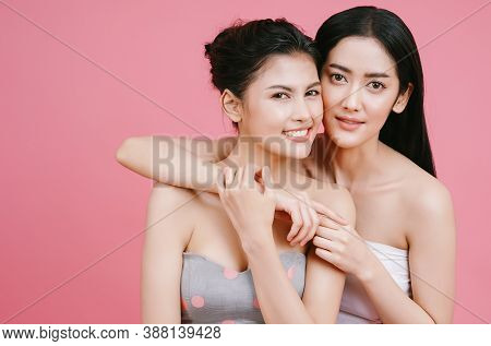 Close-up Of Two Young Asian Beautiful Woman Healthy With Skin Natural Makeup And Clean Fresh Skin Is