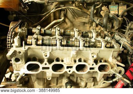 Mechanic Open Car Engine In Repair In A Service Center Industrial Work