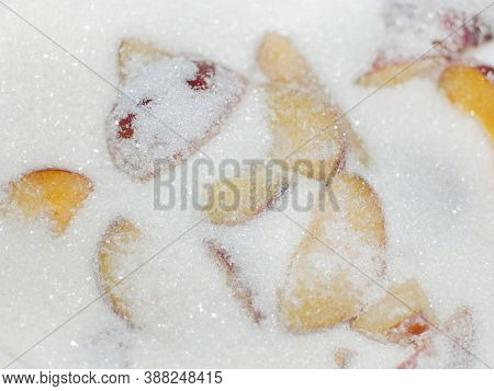 Cooking Plum Jam, Sugar And Plums In A Saucepan