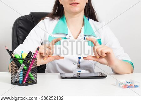 The Doctor Holds A Pack Of Pills In His Hands. Treating Diseases Of Varicose Veins And Lowering Pres