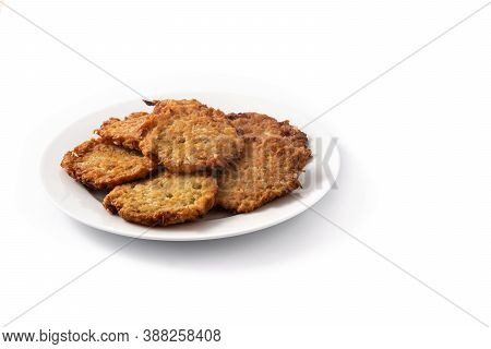 Traditional Jewish Latkes Or Potato Pancakes Isolated On White Background.copy Space