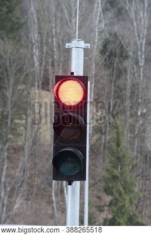Red Traffic Light On The Street