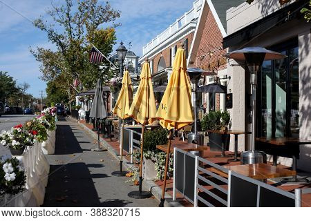NEW CANAAN, CT, USA - OCTOBER 4, 2020: Elm Street view with restaurants in New Canaan downtown during COVID-19 pandemic